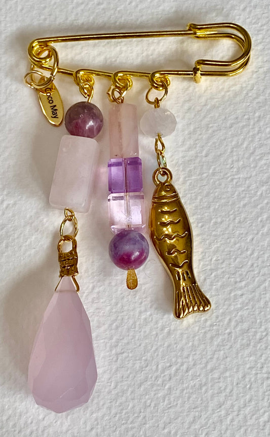 A FISH AMID THE ROSES BROOCH